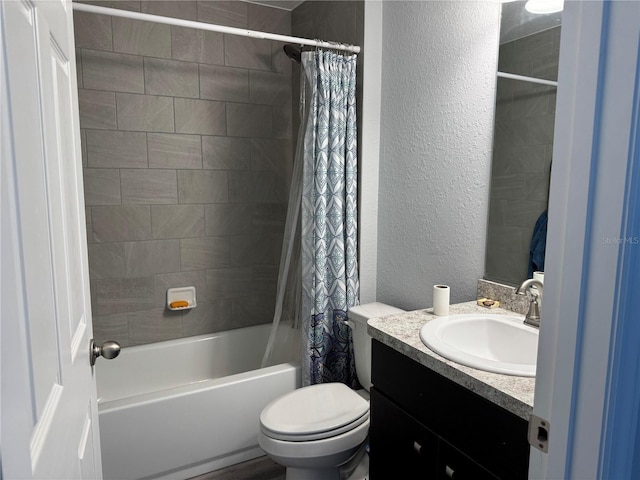 full bathroom featuring vanity, toilet, and shower / tub combo with curtain