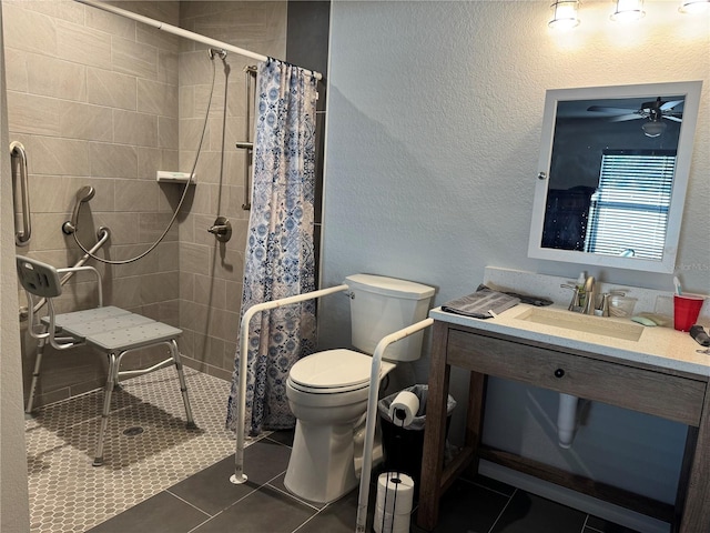 bathroom with tile patterned floors, curtained shower, sink, and toilet