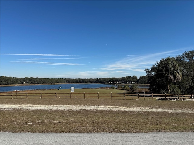 property view of water with a rural view