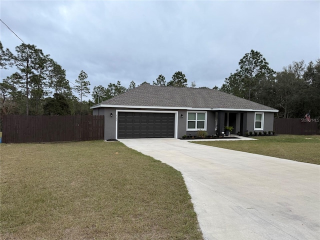 ranch-style house with a front yard and a garage