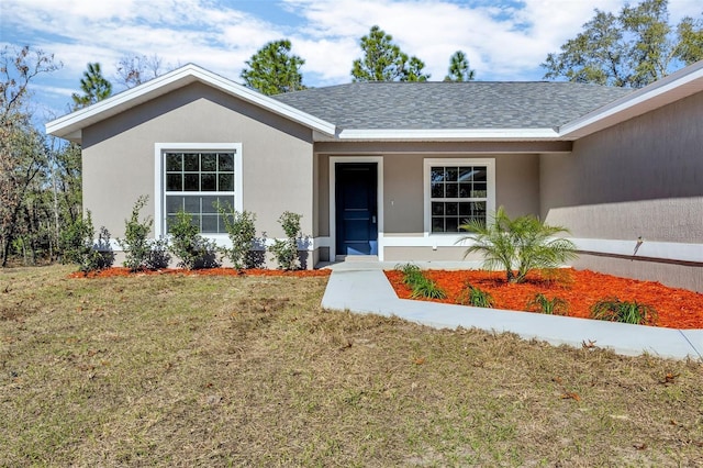 view of front of house featuring a front yard