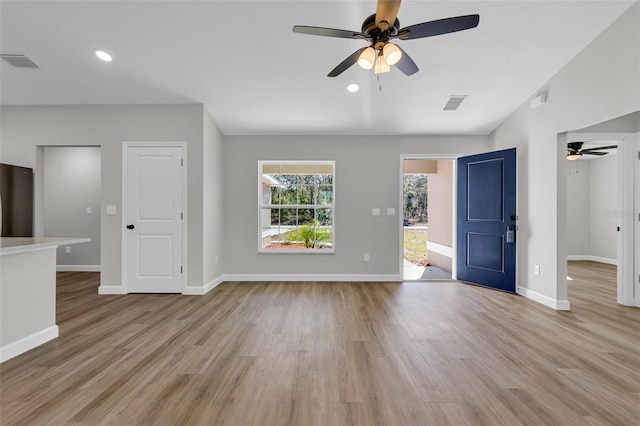 interior space featuring ceiling fan and light wood-type flooring