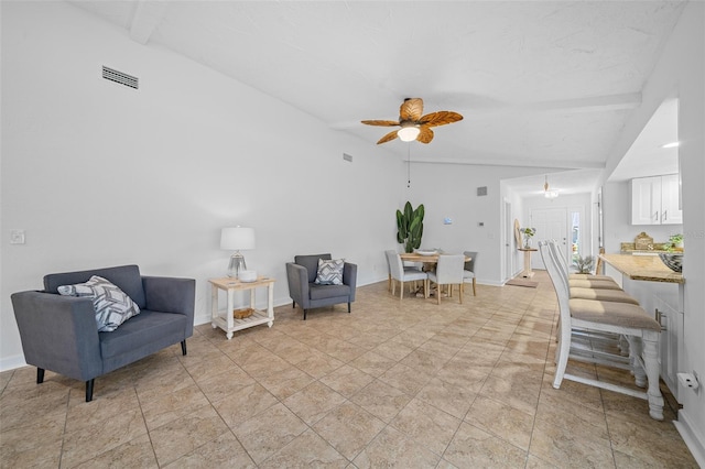 living area with lofted ceiling with beams and ceiling fan