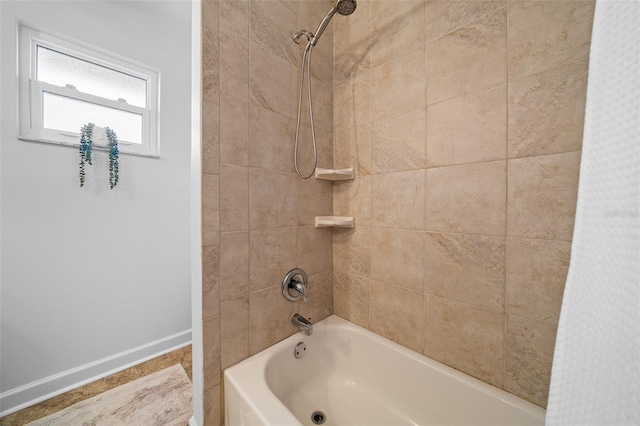 bathroom with shower / bath combo with shower curtain