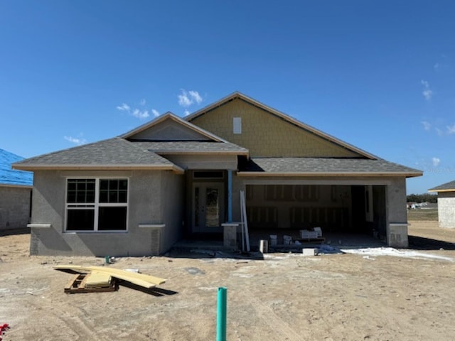 view of front of property featuring a garage