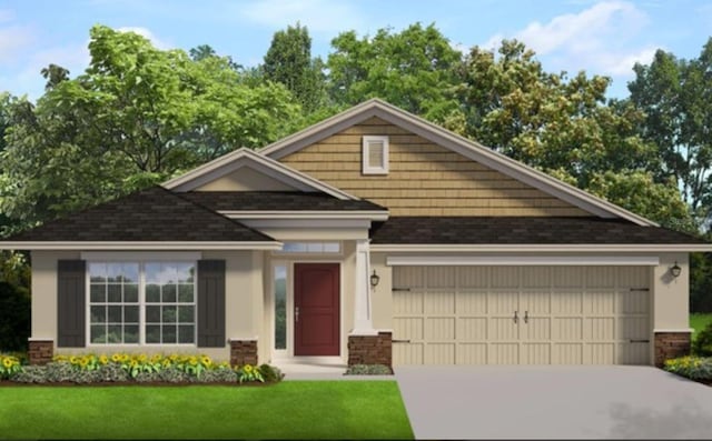 view of front of house with a garage and a front lawn