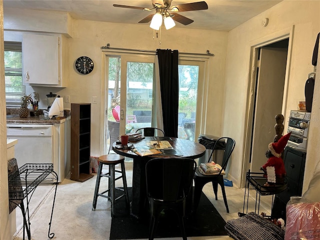 dining space featuring ceiling fan and a healthy amount of sunlight