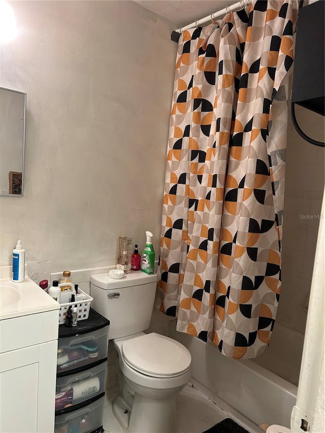 bathroom with shower / bath combo, vanity, and toilet