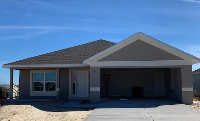 view of front of property featuring a garage