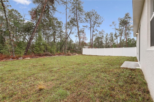 view of yard with fence