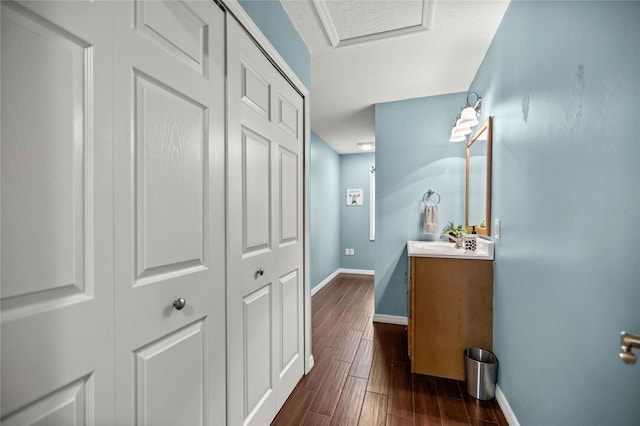 bathroom featuring hardwood / wood-style floors and vanity