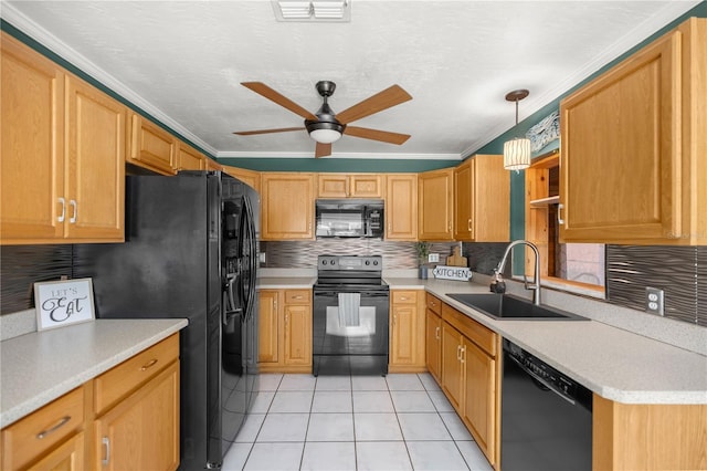 kitchen featuring ceiling fan, sink, crown molding, decorative light fixtures, and black appliances