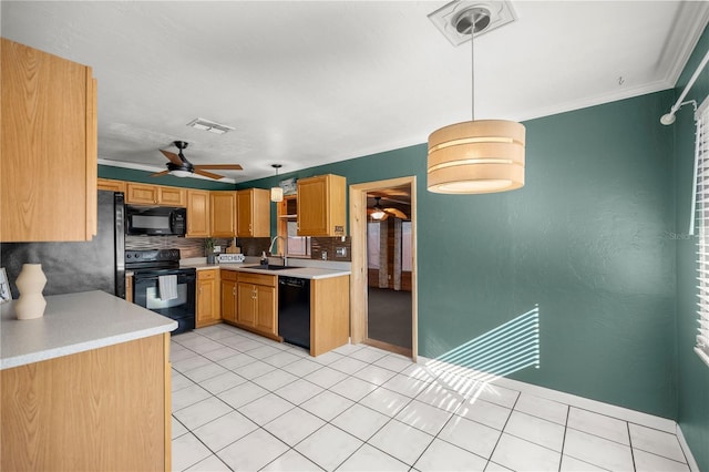 kitchen with backsplash, ceiling fan, sink, black appliances, and hanging light fixtures