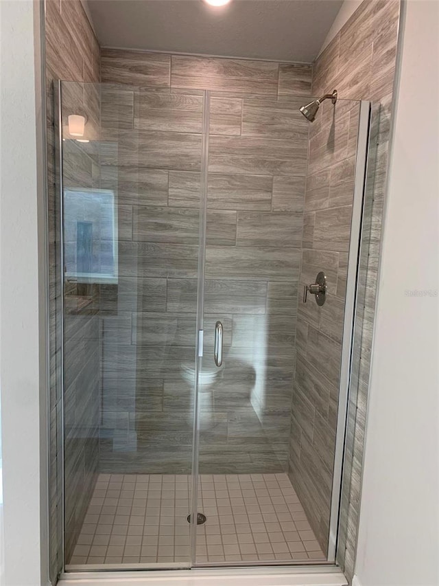 320 W Rexford Dr, Beverly Hills, FL 34465 - bathroom with a stall shower