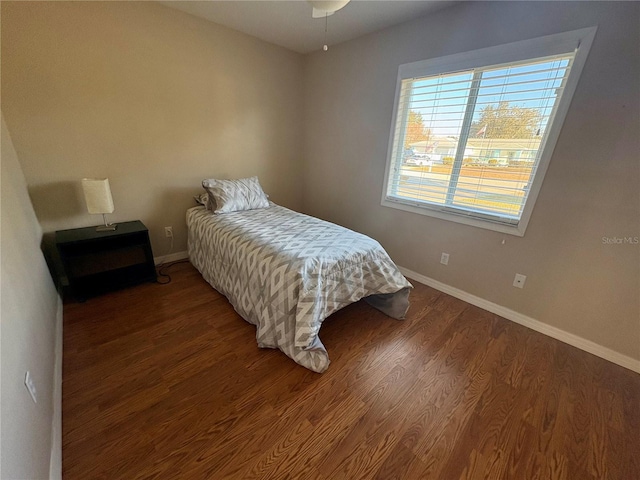 bedroom with hardwood / wood-style flooring