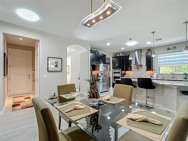 dining space featuring sink