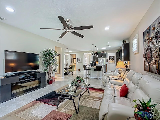 living room with ceiling fan