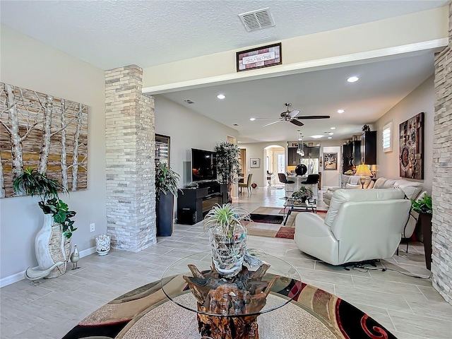 living room with ceiling fan