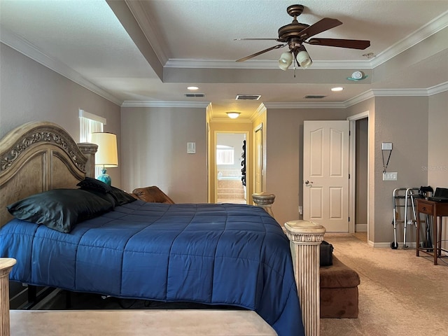 carpeted bedroom featuring a raised ceiling, ceiling fan, and crown molding