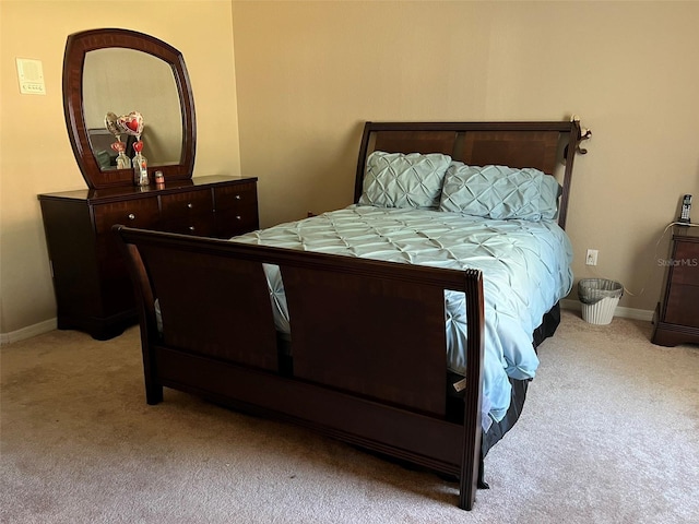 bedroom with light carpet