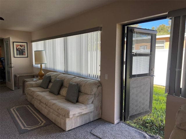 living room featuring light colored carpet