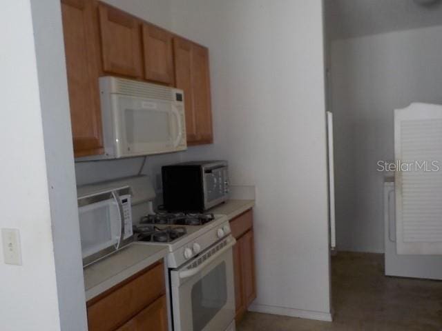 kitchen featuring white appliances