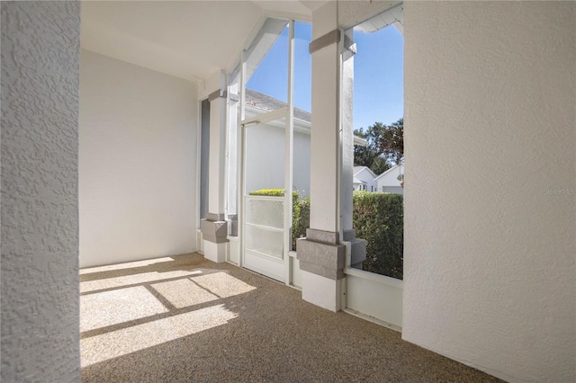 interior space featuring carpet