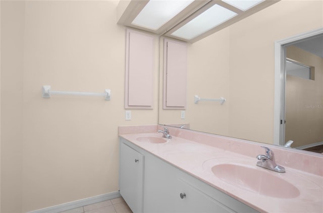 bathroom with vanity and tile patterned floors