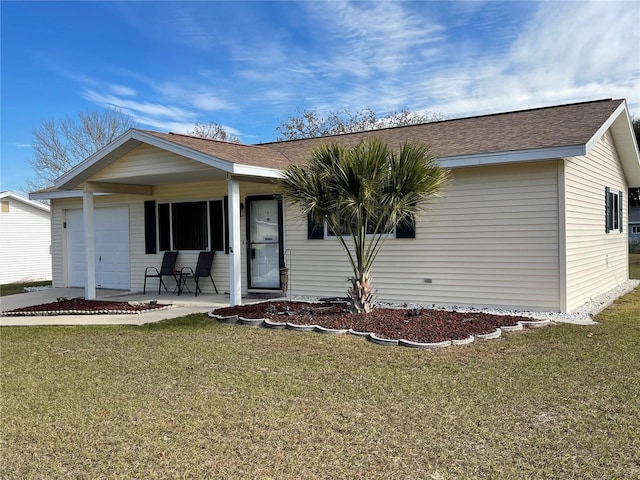 ranch-style house with a front yard and a garage