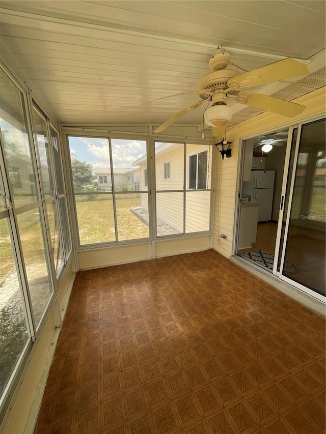 10949 SW 79th Ter, Ocala, FL 34476 - unfurnished sunroom with a ceiling fan