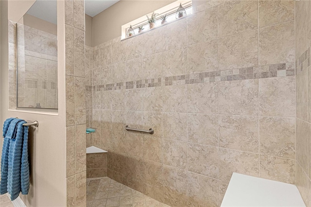 bathroom with tiled shower