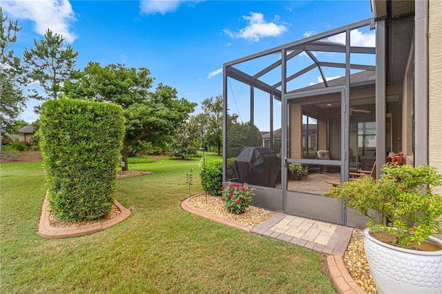 view of yard with a lanai