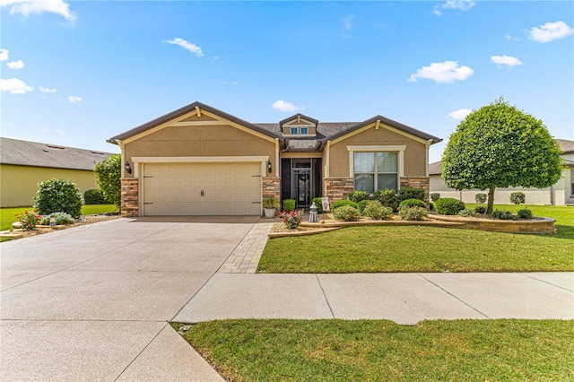 craftsman house with a garage and a front lawn