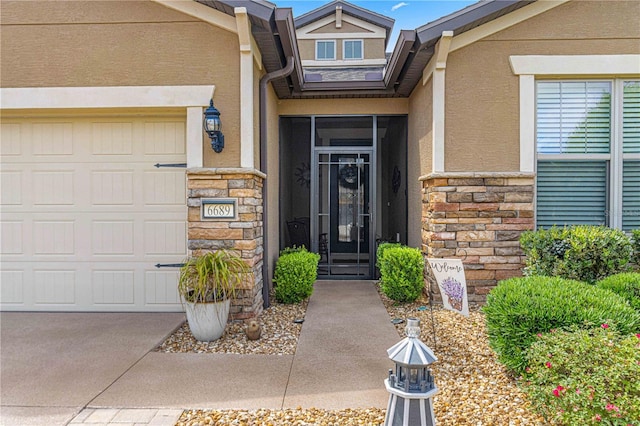 entrance to property featuring a garage