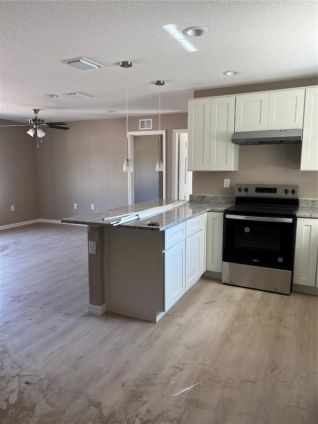 kitchen with white cabinetry, electric range, light wood-type flooring, and decorative light fixtures