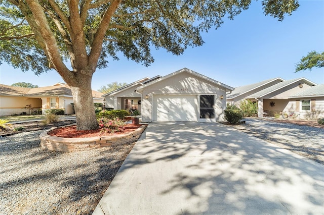 ranch-style home with a garage