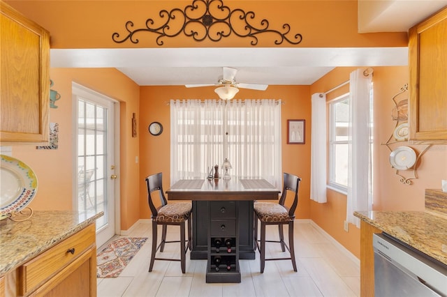 dining space featuring ceiling fan