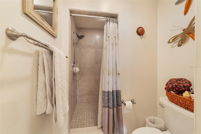 bathroom with toilet and walk in shower