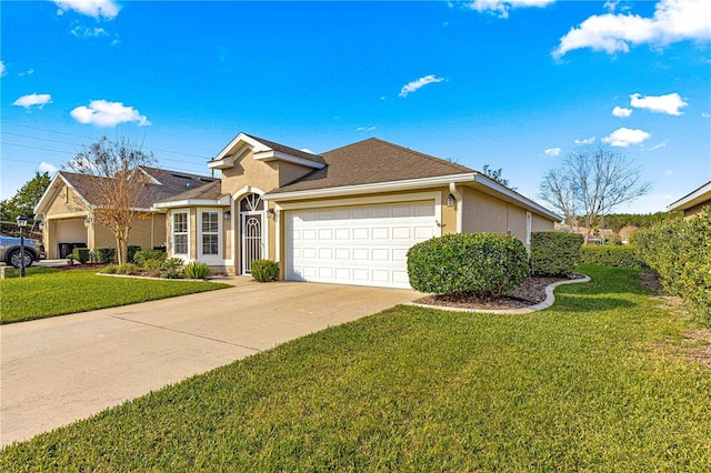 ranch-style house featuring a garage and a front lawn