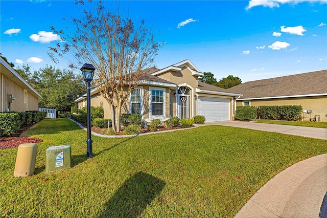 single story home featuring a garage and a front lawn