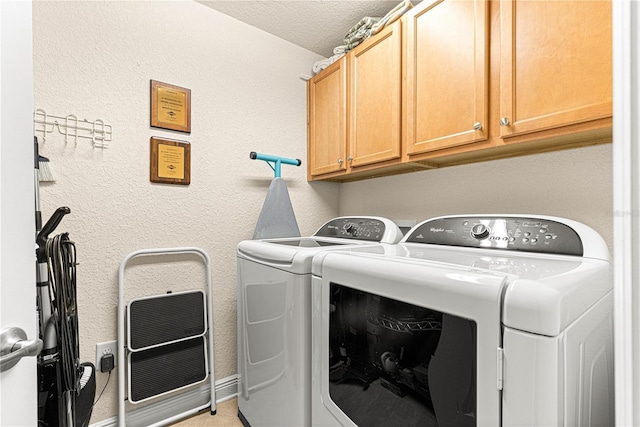 clothes washing area with cabinets, a textured ceiling, heating unit, light tile patterned floors, and separate washer and dryer