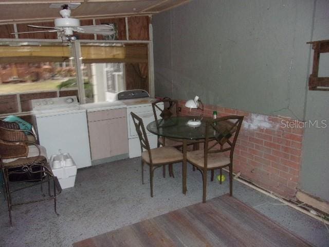 dining room with washing machine and dryer and ceiling fan