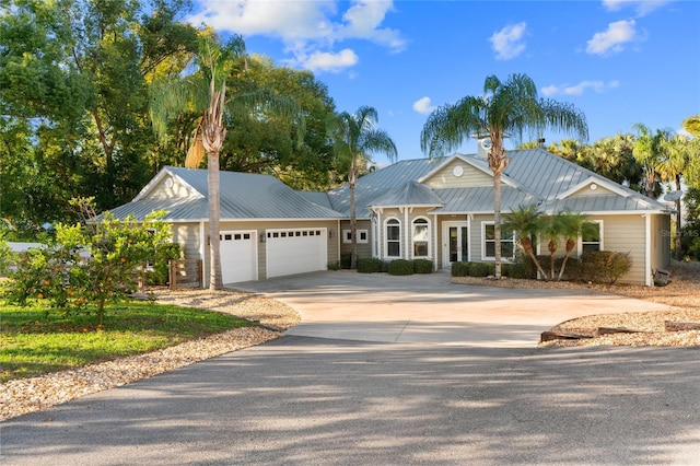 single story home featuring a garage