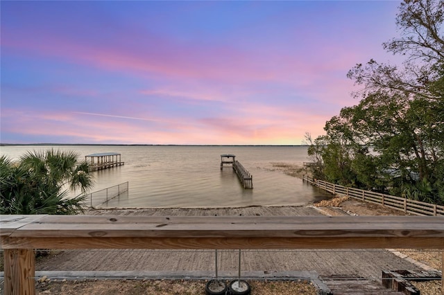 dock area featuring a water view