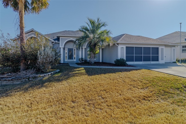 view of front facade with a front yard