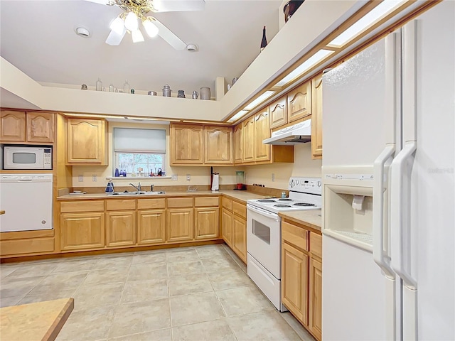 kitchen featuring light brown cabinets, white appliances, sink, ceiling fan, and light tile patterned floors