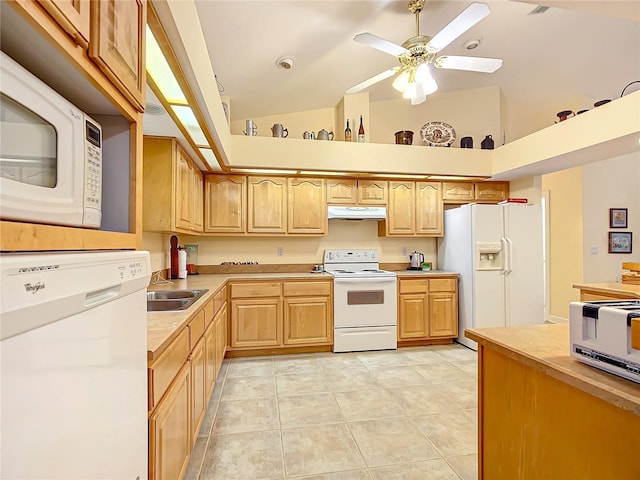 kitchen with ceiling fan, sink, vaulted ceiling, white appliances, and light tile patterned floors