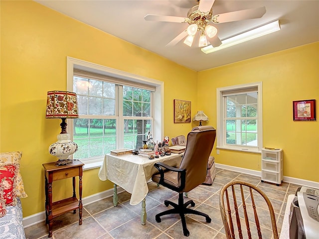 tiled home office with ceiling fan