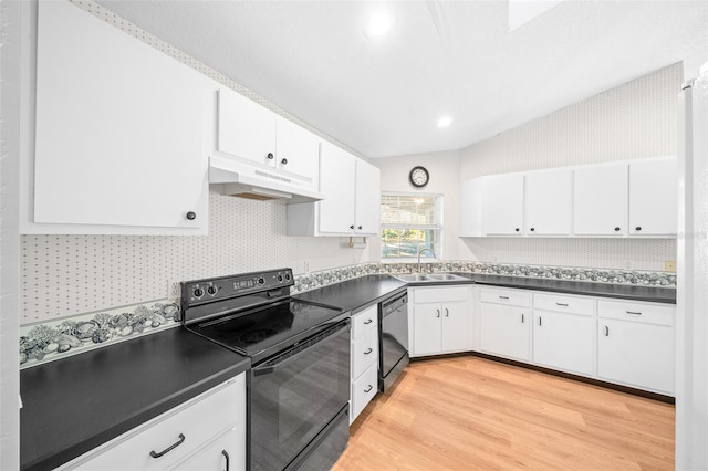 kitchen featuring white cabinets, sink, and black appliances