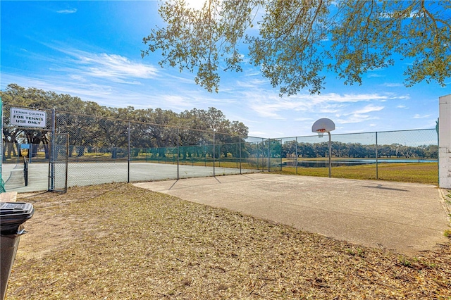 view of basketball court with tennis court